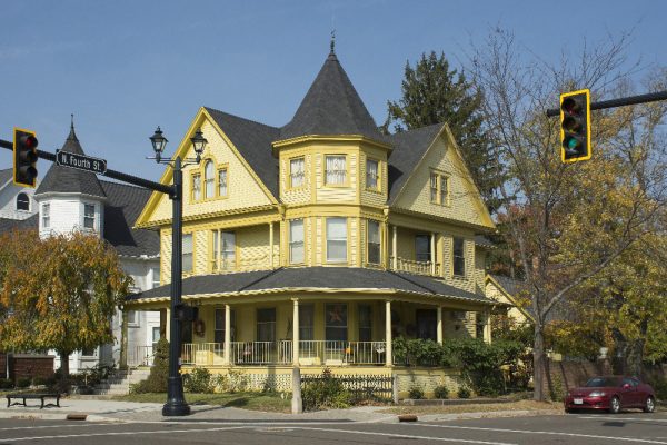 Yellow house in downtown Tipp City Ohio by Dan Cleary