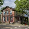 Red brick house in Downtown Springboro Ohio by Dan Cleary