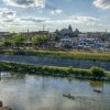 Great Miami river and downtown Piqua Ohio with kayakers by Dan Cleary