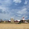 farmer in his field on tractor in Tipp City Ohio by Dan Cleary