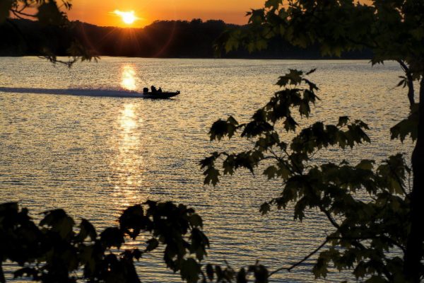 Boat at sunset on Caesars Creek by Dan Cleary