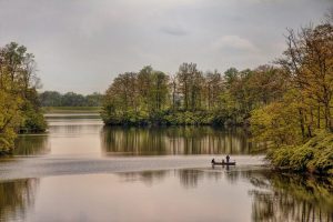 Fisherman on Armco Park lake Warren county Ohio by Dan Cleary