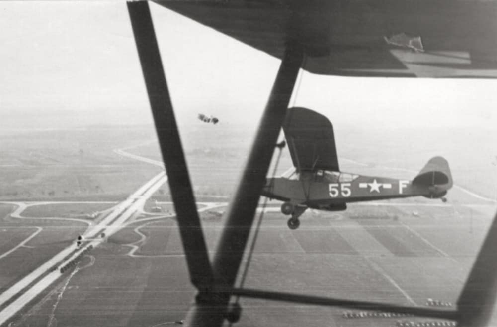 Dad's WWll plane in the air by Dan Cleary Dayton Ohio