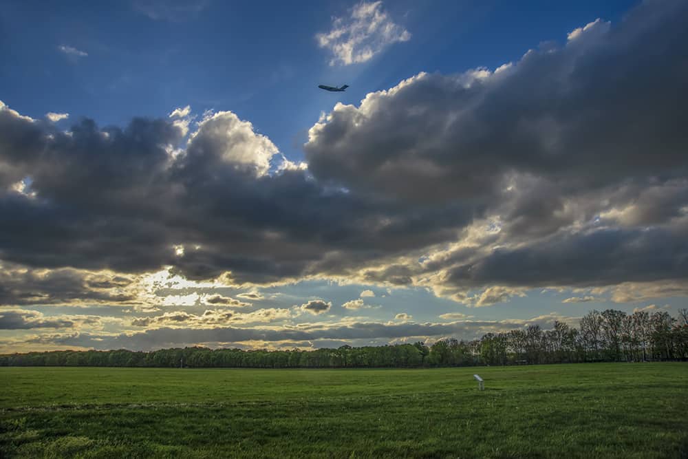 Huffman Prairie with C-17 Globmaster airplane taking off by Dan Cleary