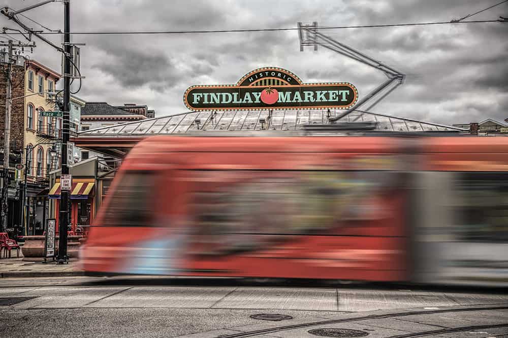 Findlay Street Market with train going by in Cincinnati Ohio by Dan Cleary