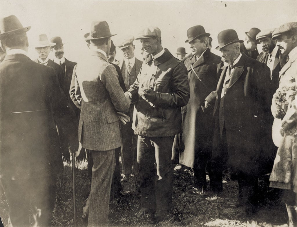 Wilbur Wright shaking hands with King Alfonzo XIII of Spain