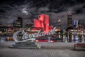 Cleveland skyline at night with red Rock and Roll Hall of fame bulding