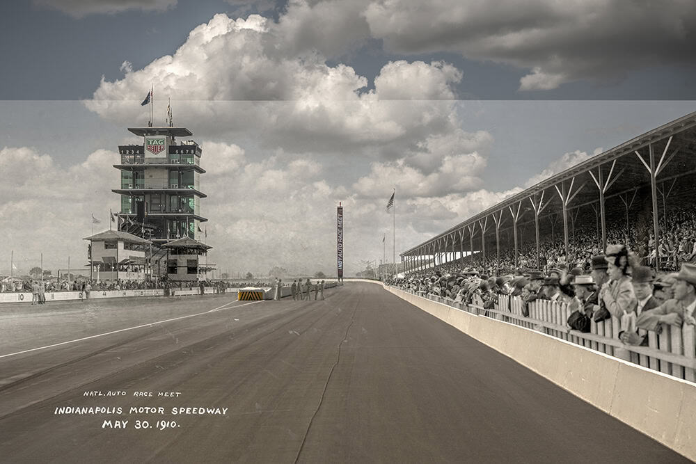 A then-and-now composite photograph by Dan Cleary showing the Indianapolis Motor Speedway before the 1910 race, blending a historic crowd-lined track and early grandstands with the modern pagoda, track surface, and dramatic clouds overhead.