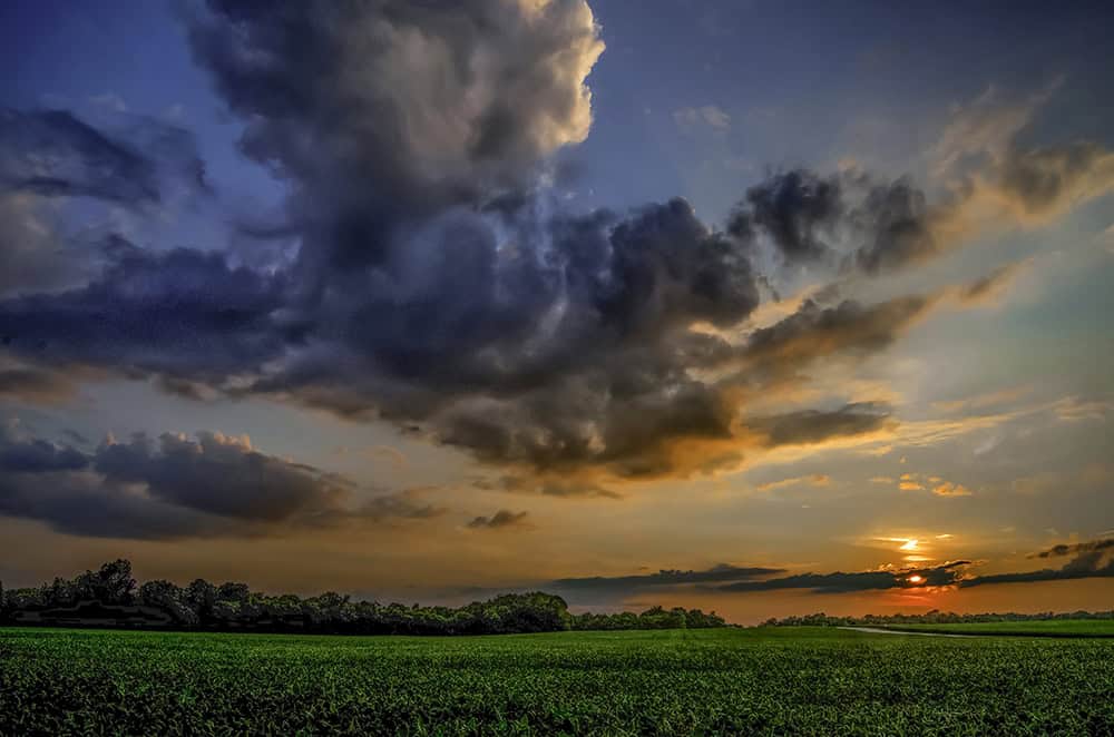 Dramatic sunset over green farmland near West Carrollton and Germantown, Ohio by Dan Cleary