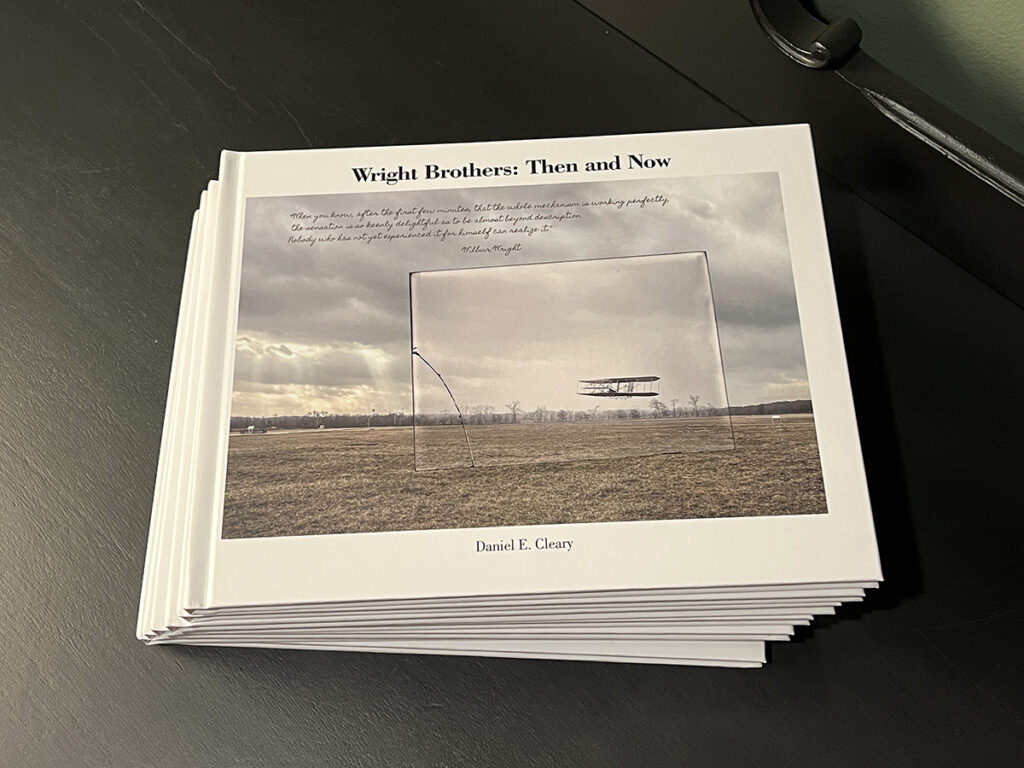 stack of hard cover Wright Brothers- Then and Now books